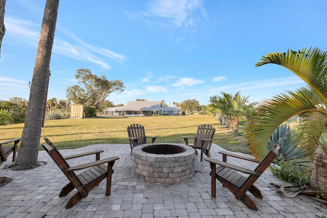 view of patio / terrace with an outdoor fire pit