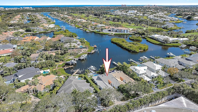 drone / aerial view with a water view