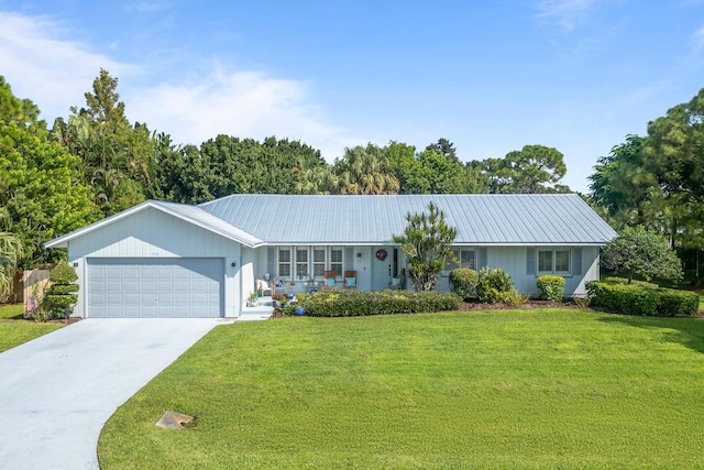 ranch-style home with a garage and a front lawn