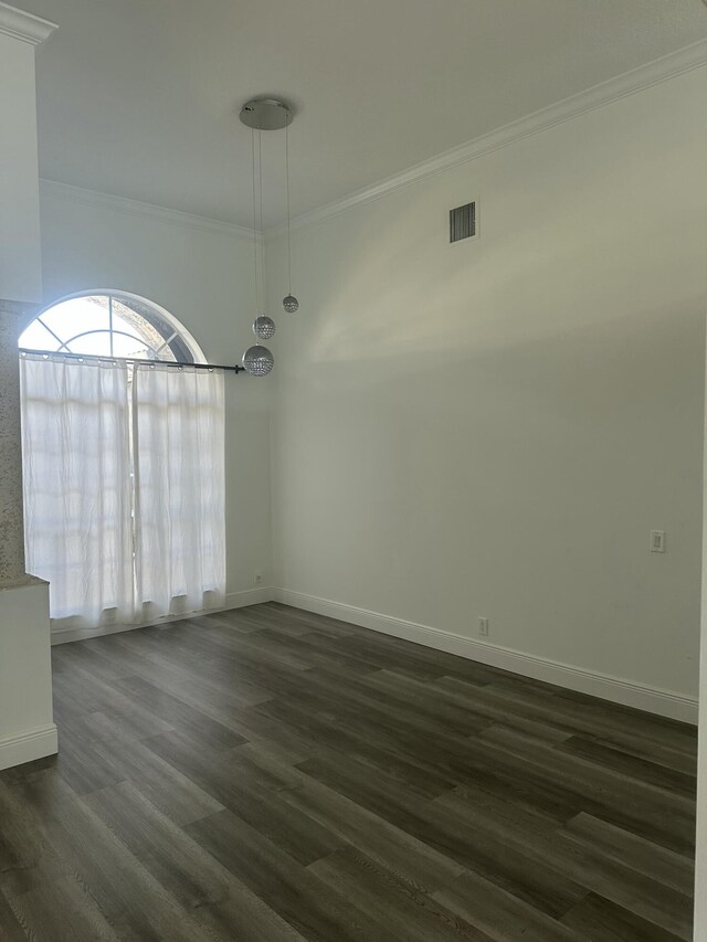 bathroom featuring ornamental molding, tiled bath, tile walls, and vanity