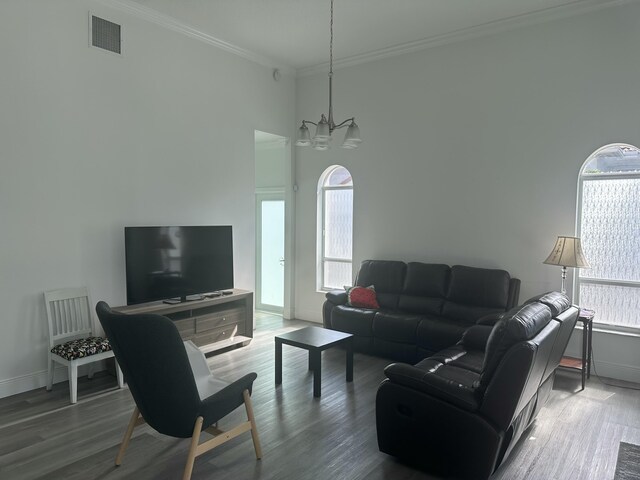 hallway featuring ornamental molding and dark hardwood / wood-style flooring