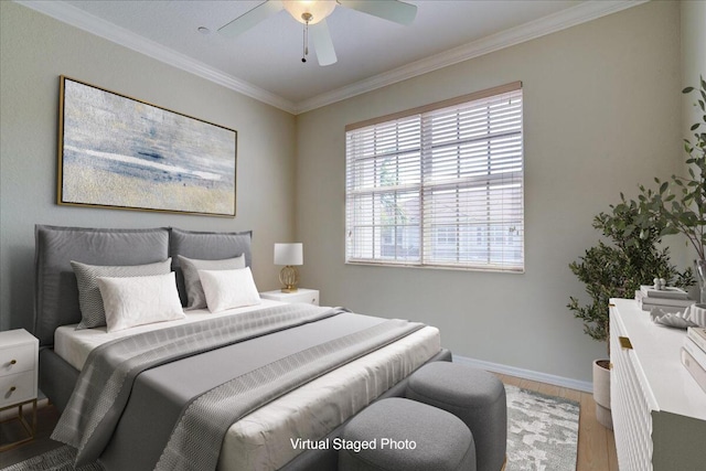 bedroom with a ceiling fan, baseboards, crown molding, and wood finished floors