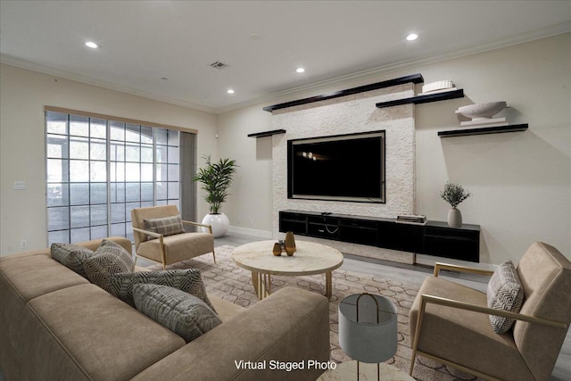 living area featuring recessed lighting, visible vents, crown molding, and wood finished floors