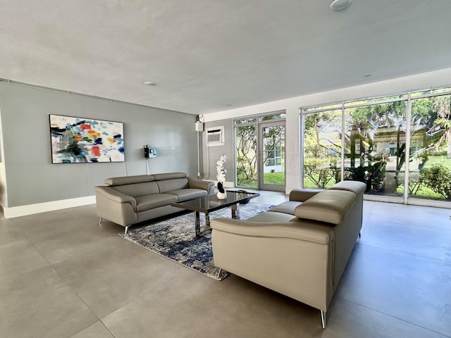living room with an AC wall unit