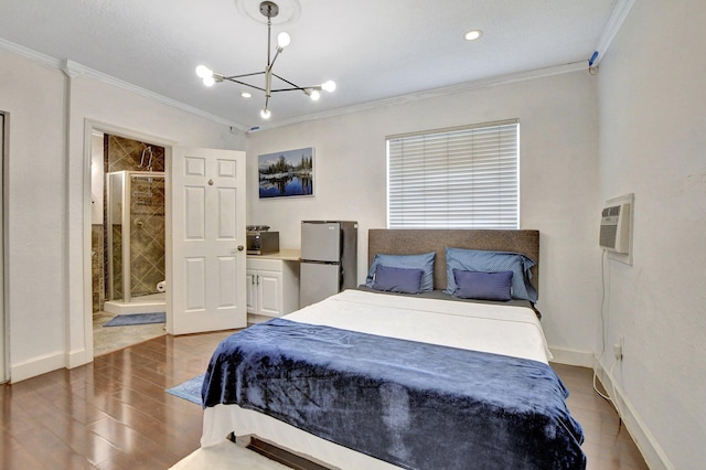 bedroom with ornamental molding, freestanding refrigerator, baseboards, and a wall mounted AC