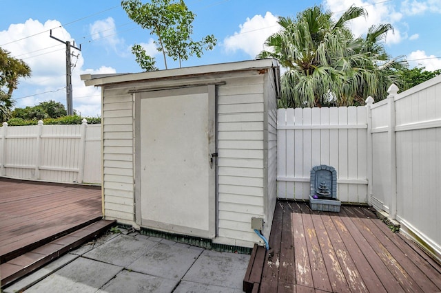 view of shed featuring a fenced backyard