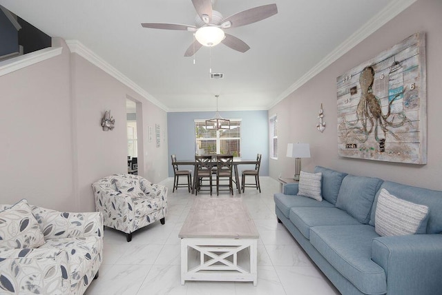 living room featuring ceiling fan and ornamental molding