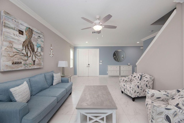 living room featuring ceiling fan and ornamental molding