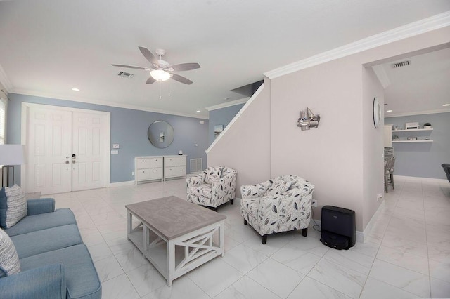 living room with ornamental molding and ceiling fan