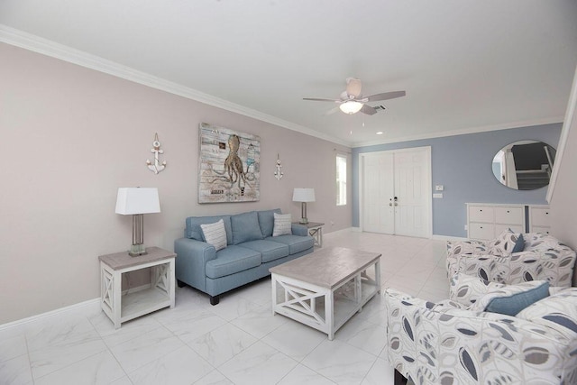 living room featuring ceiling fan and ornamental molding