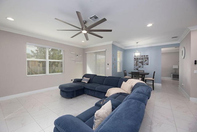 living room featuring crown molding, ceiling fan, and a healthy amount of sunlight