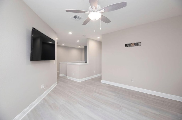 interior space with ceiling fan and light hardwood / wood-style flooring