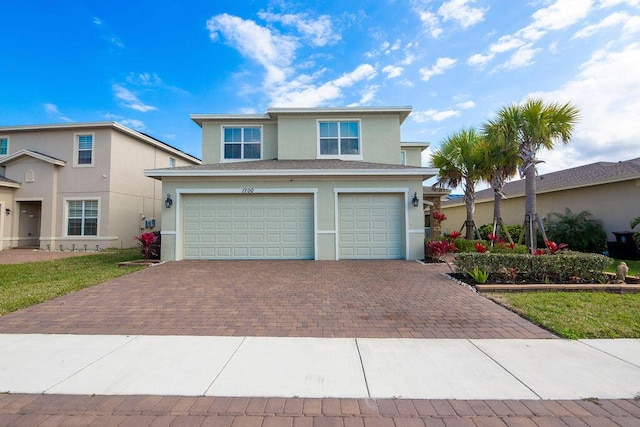 front of property featuring a garage