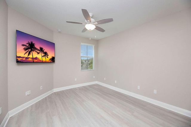 unfurnished room featuring ceiling fan and light hardwood / wood-style floors