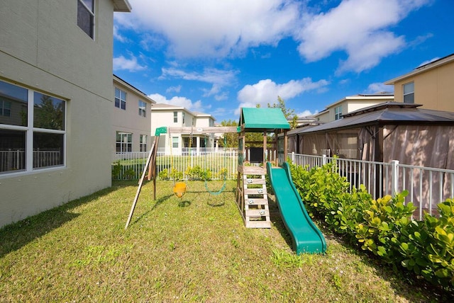 view of play area with a yard