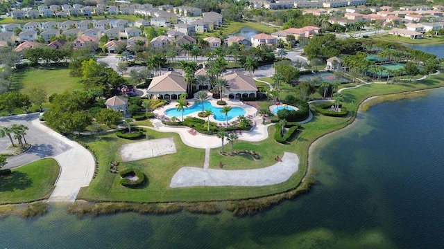 birds eye view of property featuring a water view