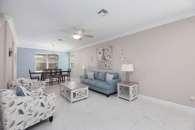 living room featuring ornamental molding and ceiling fan