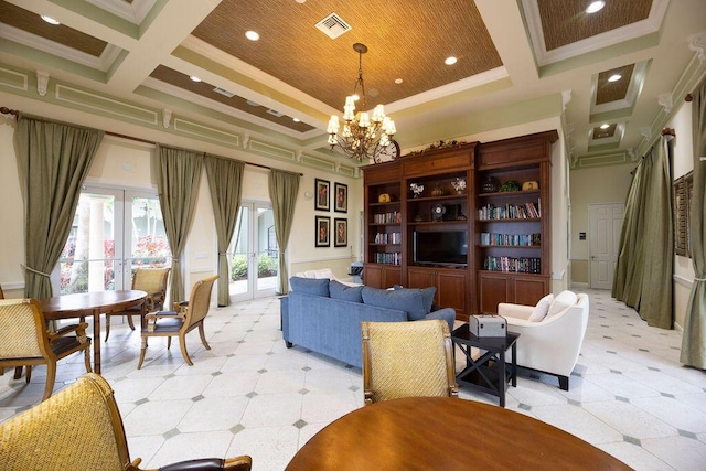 living room with crown molding, an inviting chandelier, coffered ceiling, french doors, and beamed ceiling