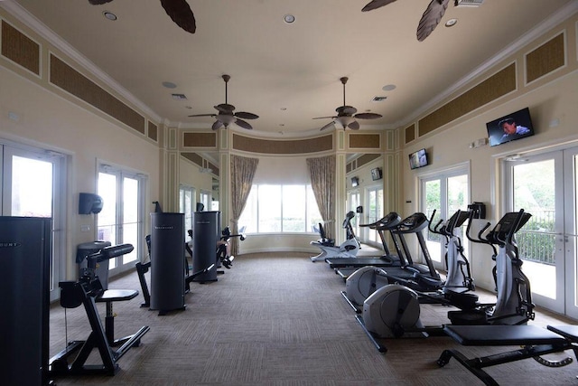 exercise room featuring crown molding, carpet, ceiling fan, and french doors