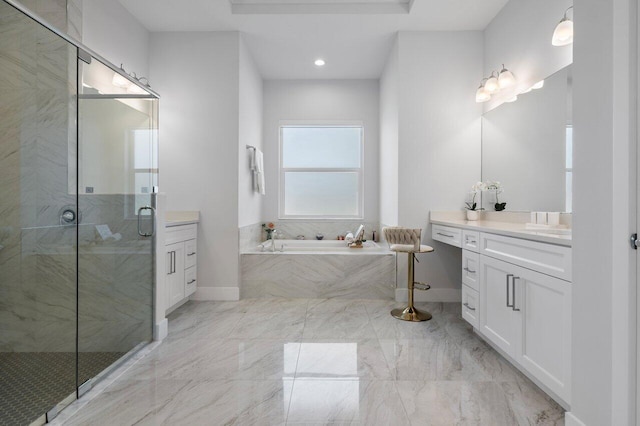 bathroom featuring shower with separate bathtub and vanity