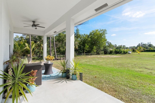 view of patio / terrace featuring ceiling fan