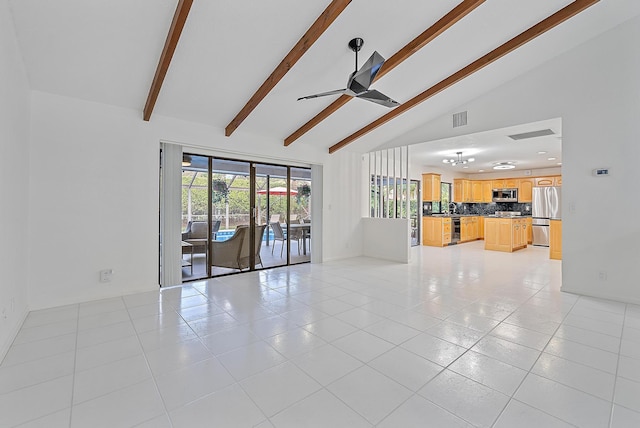 unfurnished living room featuring visible vents, beamed ceiling, and light tile patterned floors