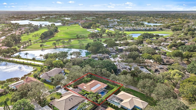 bird's eye view with a water view, a residential view, and golf course view