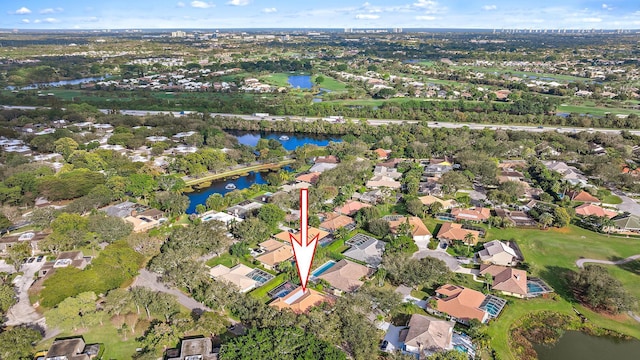 aerial view with a residential view and a water view