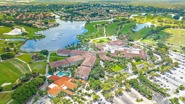 bird's eye view with a water view and a residential view