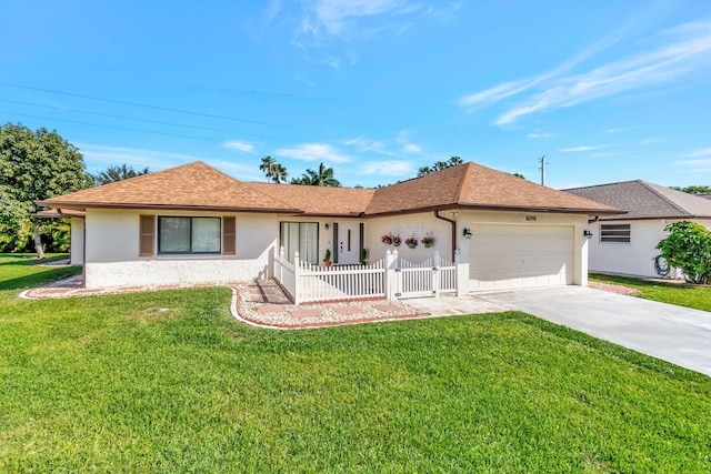 ranch-style home with roof with shingles, stucco siding, concrete driveway, an attached garage, and a front lawn