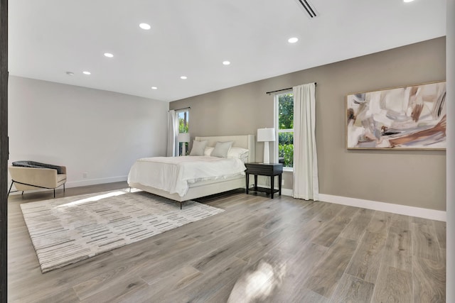 bedroom with light wood-type flooring