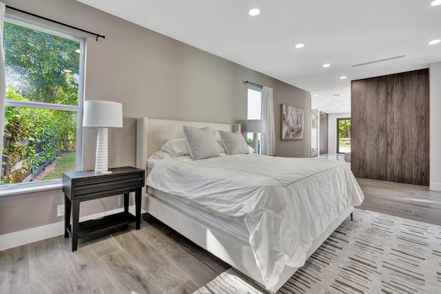 bedroom featuring light hardwood / wood-style flooring