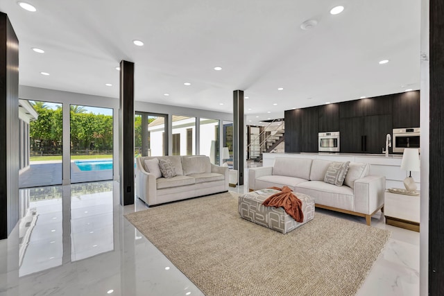 living room featuring sink