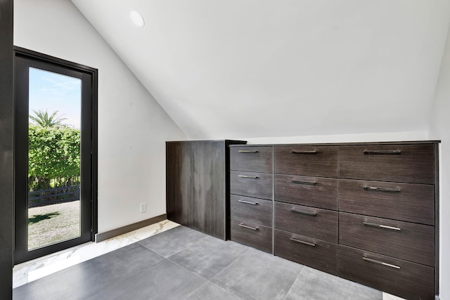 additional living space with lofted ceiling