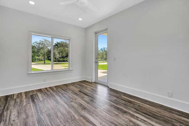 unfurnished room featuring dark hardwood / wood-style flooring