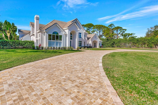 view of front of house with a front lawn