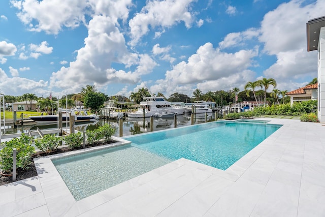 view of pool featuring a boat dock and a water view