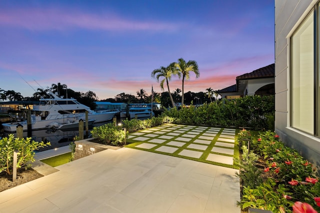 view of patio terrace at dusk