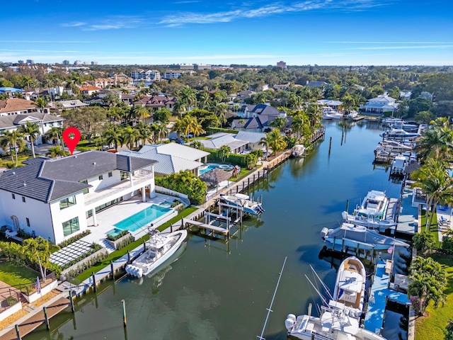 birds eye view of property featuring a water view