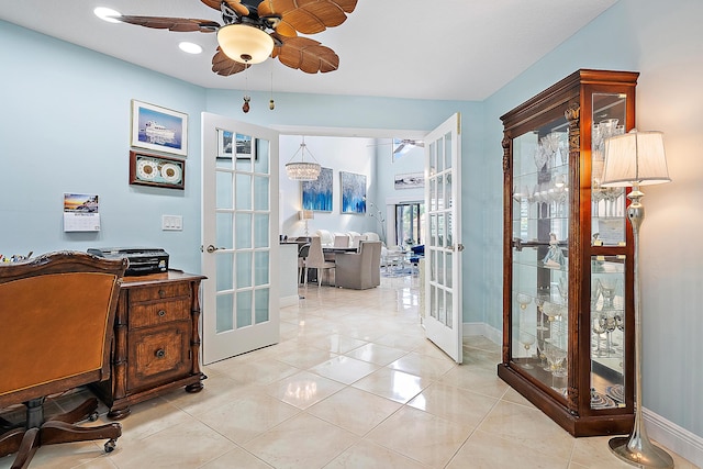 tiled office space with french doors and ceiling fan