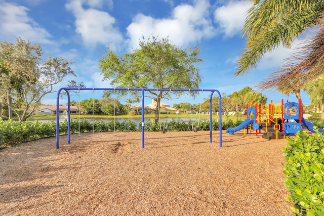 view of jungle gym featuring a water view