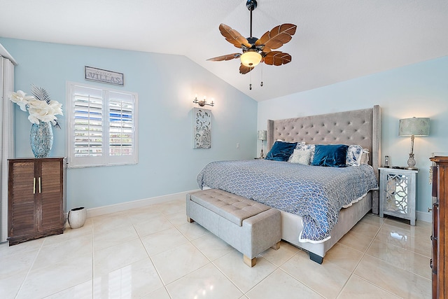 bedroom featuring vaulted ceiling, light tile patterned flooring, and ceiling fan