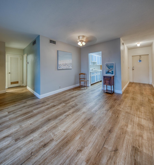 1 S Lakeside Dr Unit A2, Lake Worth Beach, FL 33460 - living room featuring baseboards, wood finished floors, and a ceiling fan