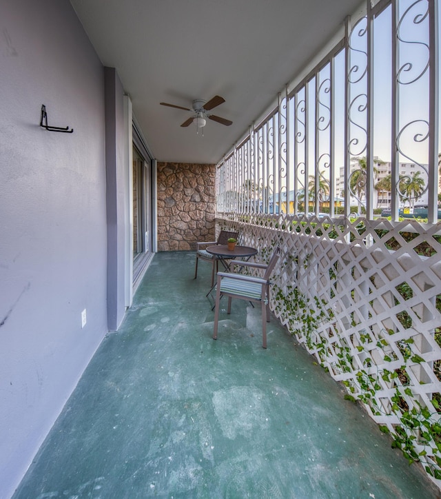 patio terrace at dusk with ceiling fan