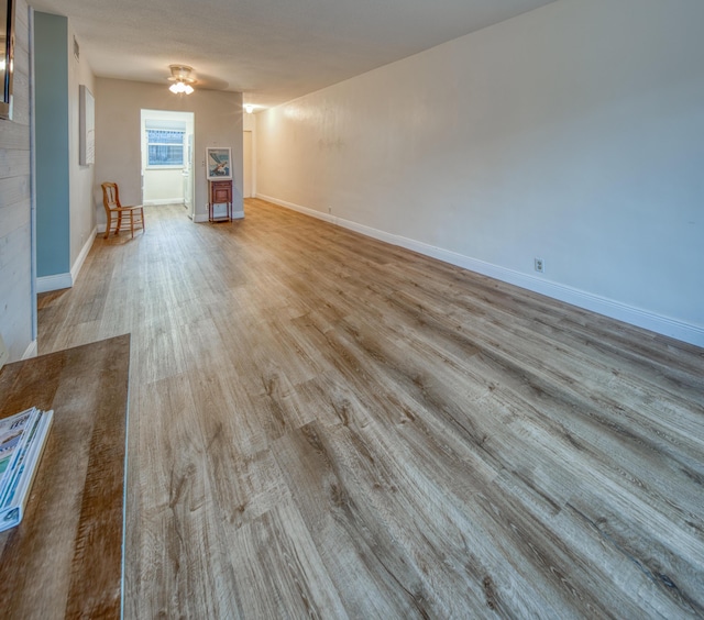 spare room featuring light wood-type flooring