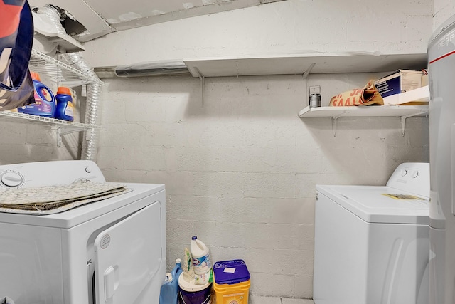 washroom with independent washer and dryer