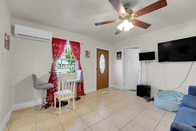 entrance foyer with light tile patterned flooring, ceiling fan, and a wall mounted AC