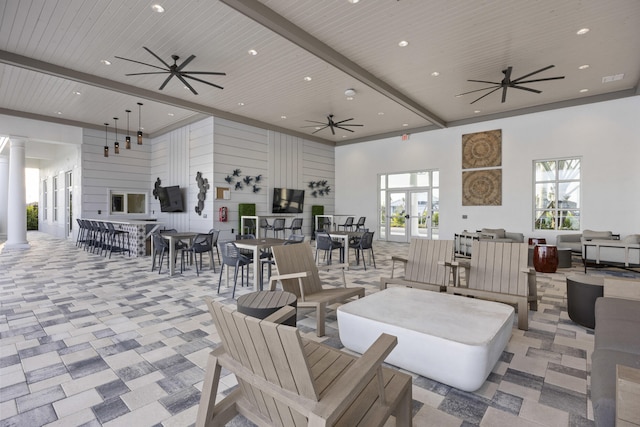 view of patio / terrace with ceiling fan and outdoor dining space