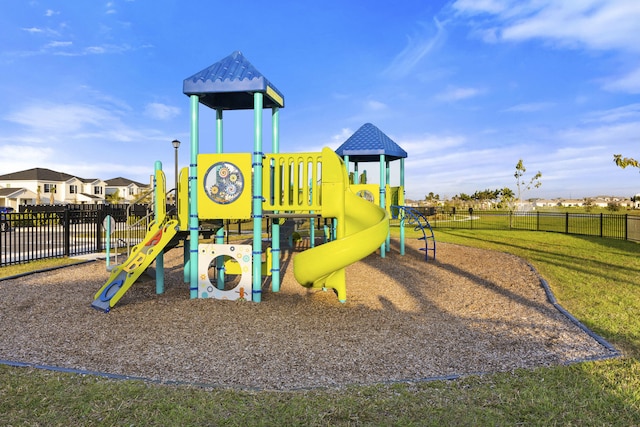 communal playground featuring fence