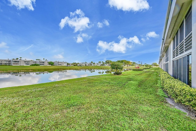 view of yard with a water view